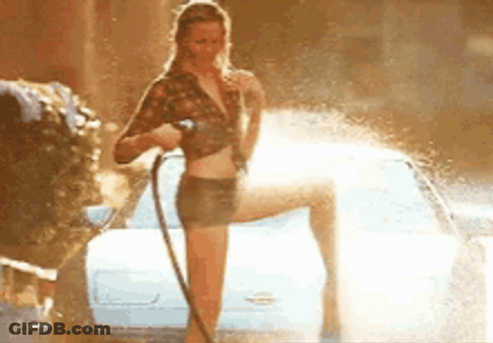 Woman Spray Water To Wet Tshirt GIF