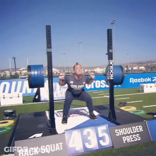 Woman Squatting Shoulder Press 435 GIF
