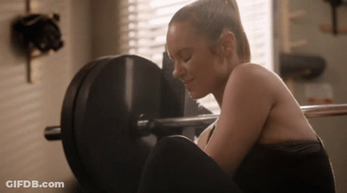 Woman Squatting With Barbell On Back GIF