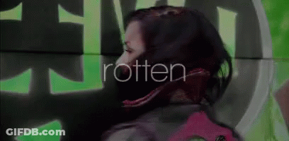 Woman Standing Before Rotten Wall GIF