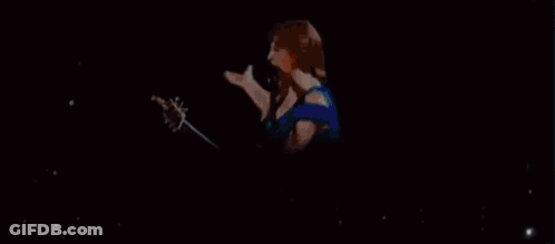 Woman Standing By Billboard P891 GIF