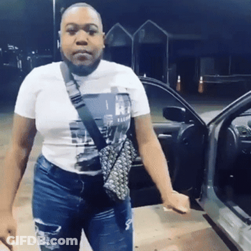 Woman Standing By Car With Open Door GIF
