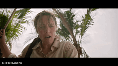 Woman Standing By Palm Tree GIF