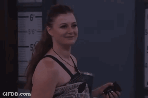 Woman Standing By Ruler Saying 6 GIF