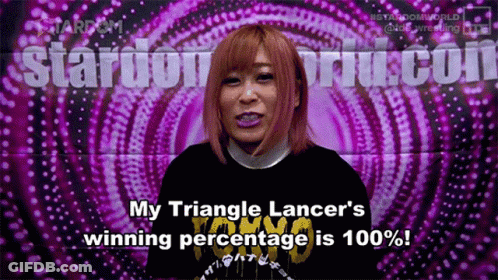 Woman Standing By Sign Saying My Triangle Lancer's Winning Percentage Is 100% GIF