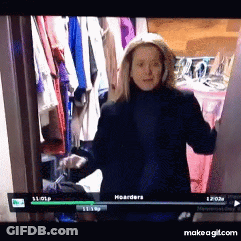 Woman Standing In Closet Hoarders GIF