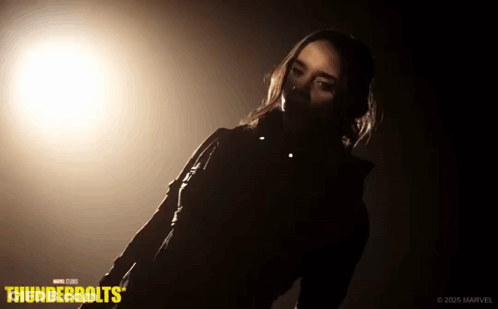 Woman Standing In Dark Room With Thunderbolts GIF