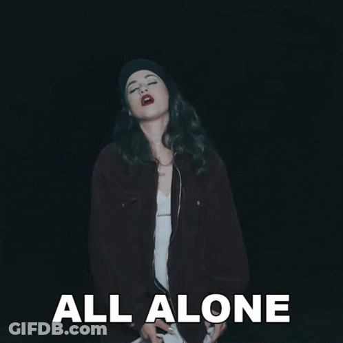 Woman Standing In Darkness All Alone GIF