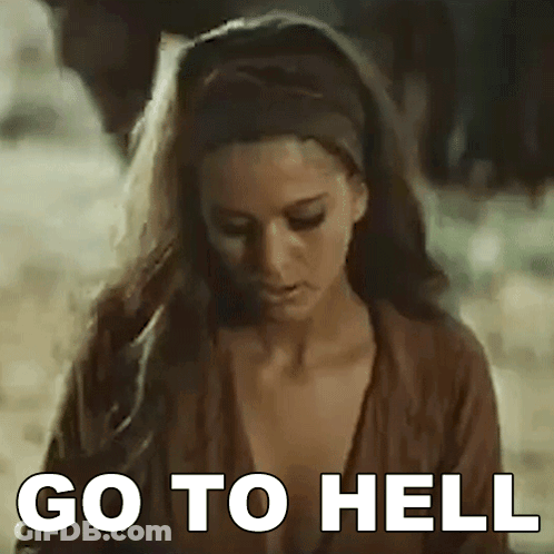 Woman Standing In Dirt With Go To Hell On Face GIF