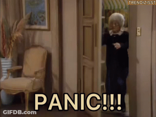 Woman Standing In Doorway With Panic GIF