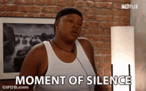 Woman Standing In Front Of Brick Wall GIF
