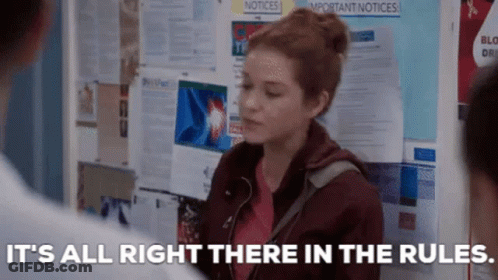 Woman Standing In Front Of Bulletin Board GIF