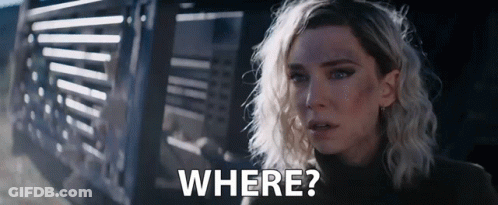 Woman Standing In Front Of Cage GIF