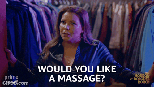 Woman Standing In Front Of Closet Would You Like A Massage GIF