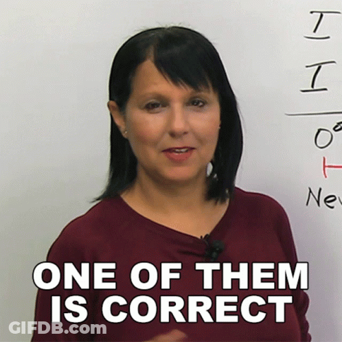 Woman Standing In Front Of Correct Word GIF