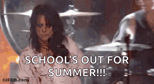 Woman Standing In Front Of Drum Set With School's Out For Summer GIF