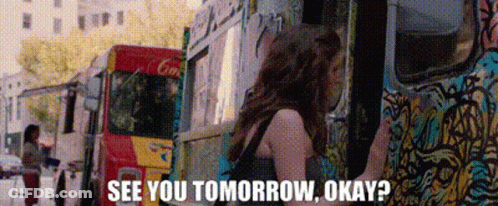 Woman Standing In Front Of Food Truck Saying See You Tomorrow GIF