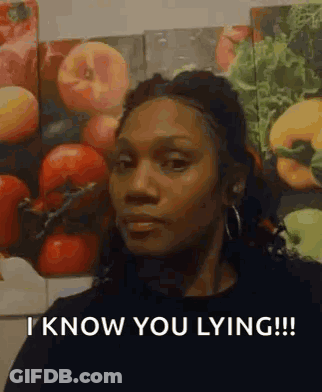 Woman Standing In Front Of Fruit Painting Saying I Know You Lying GIF