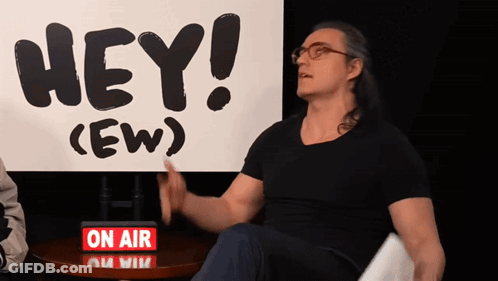 Woman Standing In Front Of Hey Crew Sign GIF