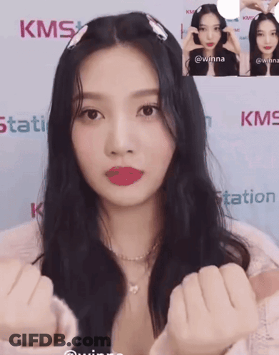 Woman Standing In Front Of KMS Station GIF