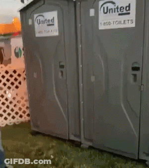 Woman Standing In Front Of Portable Toilet Saying United GIF