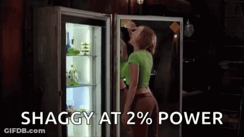 Woman Standing In Front Of Refrigerator GIF