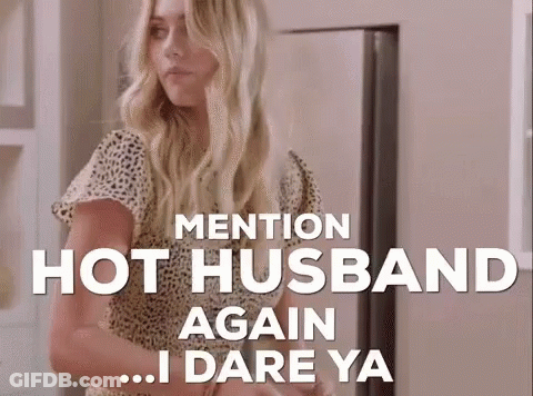 Woman Standing In Front Of Refrigerator Saying Mention Hot Husband Again GIF