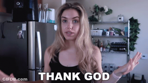 Woman Standing In Front Of Refrigerator Saying Thank God GIF