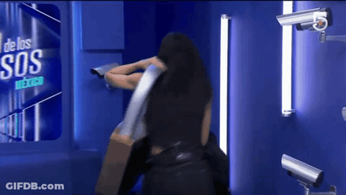 Woman Standing In Front Of SOS Sign GIF