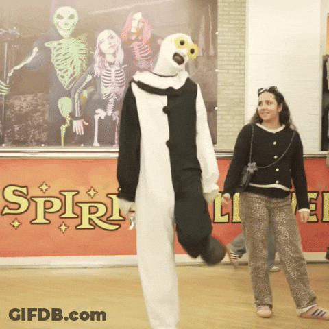 Woman Standing In Front Of Spirit Sign GIF