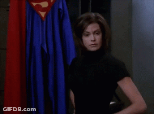 Woman Standing In Front Of Superman Cape GIF