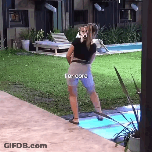 Woman Standing In Front Of Swimming Pool With Flor Core GIF