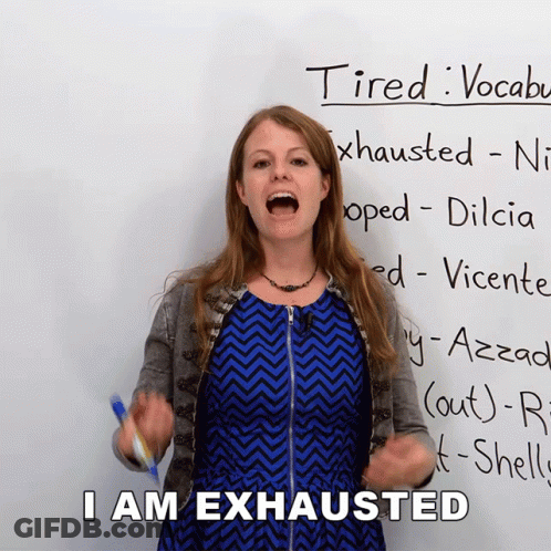 Woman Standing In Front Of Tired Sign GIF