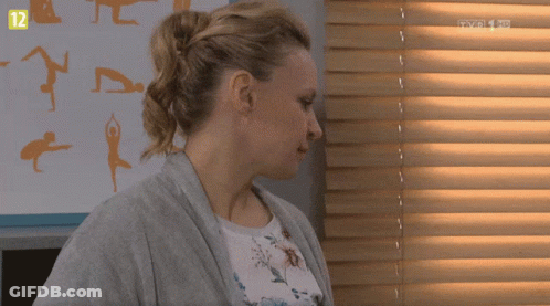 Woman Standing In Front Of TVP HD Sign GIF