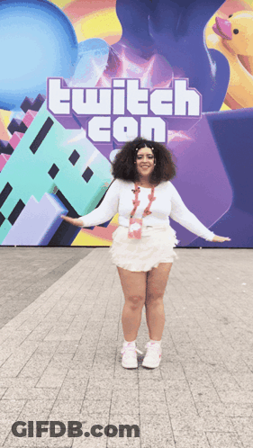 Woman Standing In Front Of Twitch Con Sign GIF