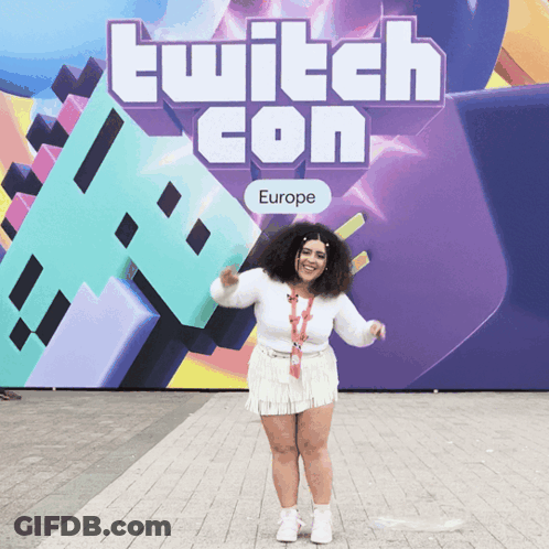 Woman Standing In Front Of Twitch Con Sign GIF