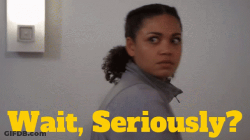 Woman Standing In Front Of Wait Seriously Wall GIF