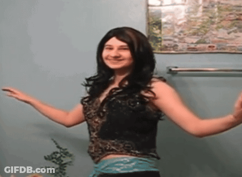 Woman Standing In Front Of Wall With Picture GIF
