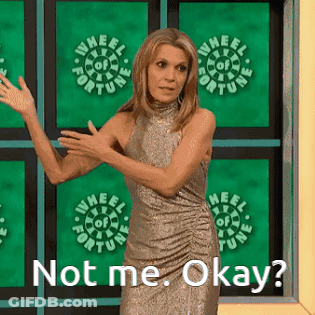 Woman Standing In Front Of Wheel Of Fortune Sign GIF
