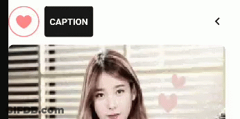 Woman Standing In Front Of Window With Caption Button GIF