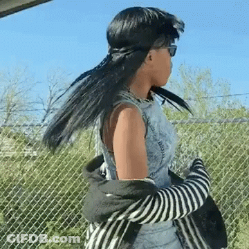 Woman Standing In Front Of Window With #Uploadtv GIF