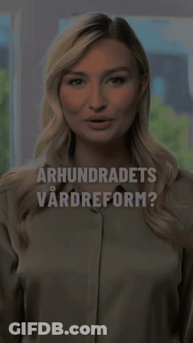 Woman Standing In Front Of Window With Words GIF