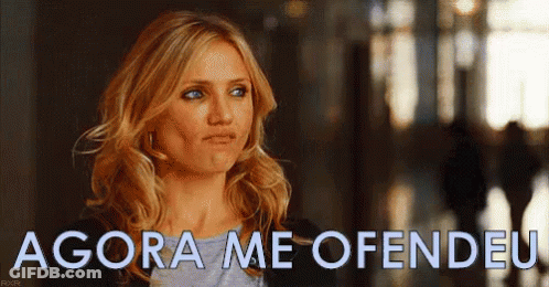 Woman Standing In Hallway With Offended Face GIF