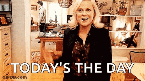 Woman Standing In Living Room With Today GIF