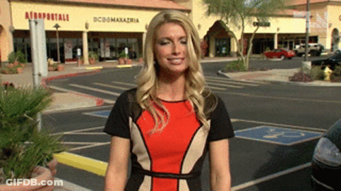 Woman Standing In Parking Lot GIF