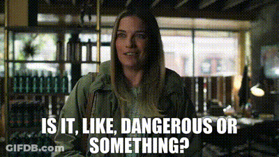 Woman Standing In Room Saying Is It Like Dangerous Or Something GIF