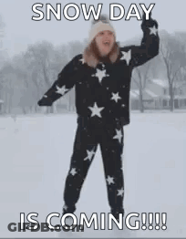 Woman Standing In Snow With Outstretched Arms GIF