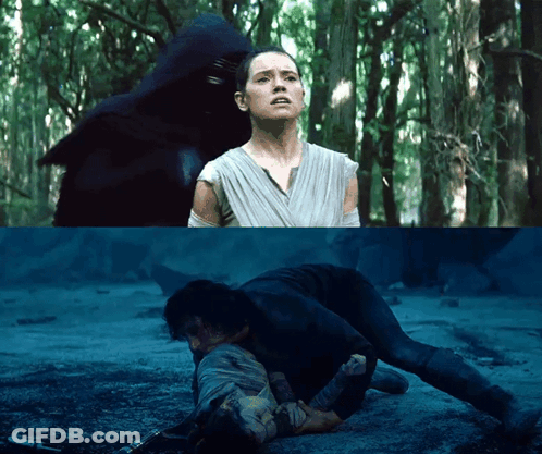 Woman Standing In Woods While Man Laying On Ground GIF