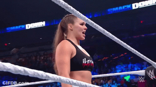 Woman Standing In Wrestling Ring GIF