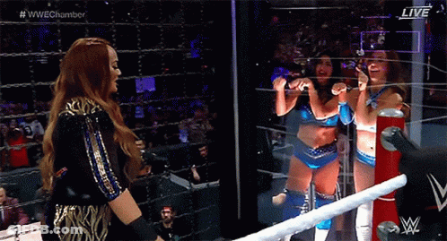 Woman Standing In Wrestling Ring GIF